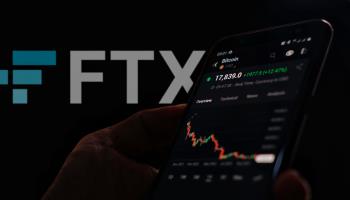 FTX logo and Bitcoin price trend chart on a smartphone (Shutterstock)