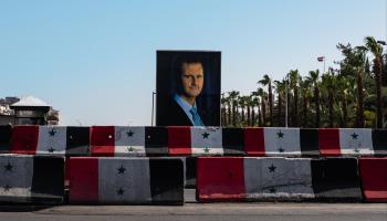 Image of Bashir al-Assad, President of Syria at checkpoint in Damascus (Shutterstock)