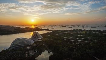The sun rising above the Singapore Strait (Xinhua/Shutterstock)