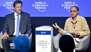 Finance Minister Fernando Haddad (l) and Environment Minister Marina Silva speaking at Davos (GIAN EHRENZELLER/EPA-EFE/Shutterstock)