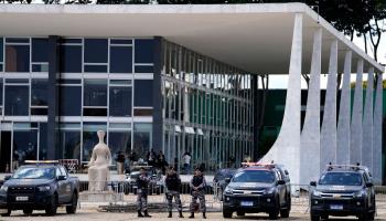 Military police outside the Supreme Court building in Brasilia (Eraldo Peres/AP/Shutterstock)