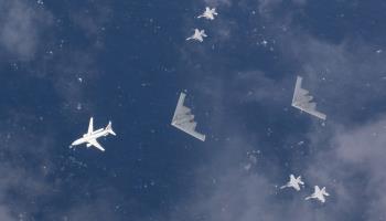 Four RAAF fighters accompany two US B-2 bombers during a joint training exercise over the Australian coast, August 4, 2022 (Lt Cmdr Andrew Bishline/U S Navy/UPI/Shutterstock)