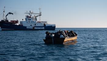 Migrant and rescue boats off the coast of Lampedusa, Italy (Ximena Borrazas/SOPA Images/Shutterstock)