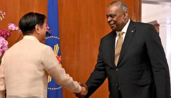 US Defense Secretary Lloyd James Austin (R) shakes hands with Philippine President Ferdinand Marcos Jr. at the Malacanang Palace in Manila, February 2, 2023 (Jam Sta Rosa/AP/Shutterstock)