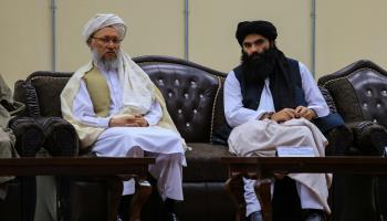 Deputy Prime Minister Mullah Abdul Salam Hanafi (L) and Interior Minister Sirajuddin Haqqani, August 2022 (Stringer/EPA-EFE/Shutterstock) 