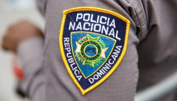 The arm badge of a police officer in Punta Cana. February, 2023. (AP/Shutterstock)