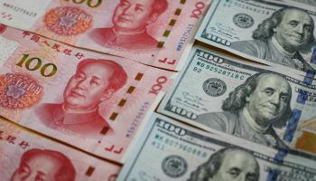 Renminbi and dollars (Mark R Cristino/EPA-EFE/Shutterstock)