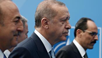 
President R. Tayyip Erdogan and Foreign Minister Mevlut Cavusoglu at NATO's HQ (Shutterstock)