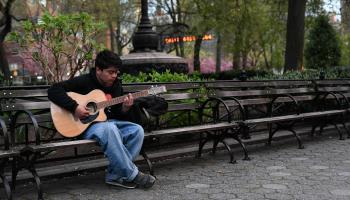 A young man alone in Union Square in New York City (Miguel Juarez Lugo/ZUMA Wire/Shutterstock)