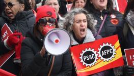 Members of the Public Service Alliance of Canada (PSAC) demonstrate outside the Treasury Board building in Ottawa, March 31, 2023 (Canadian Press/Shutterstock)