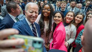 President Joe Biden takes a selfie with guests after speaking at Ulster University in Belfast, April 12, 2023 (White House/ZUMA Press Wire/Shutterstock)