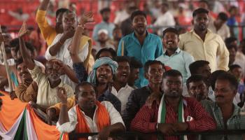 Attendees cheering a speaker during an election rally held by India's main opposition Congress party in Karnataka state (Jagadeesh NV/EPA-EFE/Shutterstock)