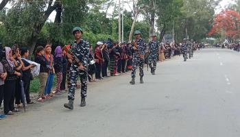 Security personnel conducting a route march yesterday, during Home Minister Amit Shah's visit to Manipur (Anuwar Hazarika/NurPhoto/Shutterstock)