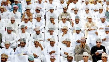 Unemployed Omanis gathering at the national soccer stadium to apply for vacancies as new policy recruits, 2011 (Robin Utrecht/EPA/Shutterstock)