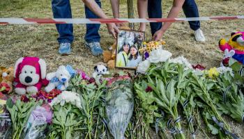 Relatives of two victims killed by a Russian missile strike on Kyiv set up a memorial near where they died, Kyiv, June 1 (Celestino Arce Lavin/ZUMA Press Wire/Shutterstock).