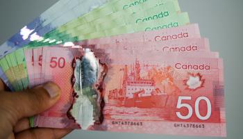 Canadian banknotes (Dinendra Haria/SOPA Images/Shutterstock)