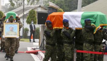 Ivorian soldiers of the MINUSMA peacekeeping operation carry the remains of a fallen comrade (Legnan Koula/EPA-EFE/Shutterstock)