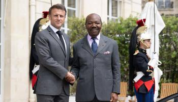 Gabonese President Ali Bongo Ondimba with French President Emmanuel Macron, June 2023 (Jacques Witt/SIPA/Shutterstock)