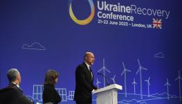 Ukrainian Prime Minister Denis Shmihal (R) addresses the closing session on of the Ukraine Recovery Conference (URC), London, June 22 ( Andy Rain/Pool/EPA-EFE/Shutterstock)