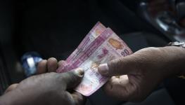 A payment in Sri Lankan rupees (Richard Sowersby/Shutterstock)