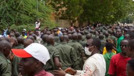 Pro-coup demonstrators cheer on security forces, July 30 2023 (Issifou Djibo/EPA-EFE/Shutterstock)