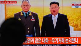A television image of Russian Defence Minister Sergei Shoigu with North Korean leader Kim Jong-un in Pyongyang (Kim Jae-Hwan/SOPA Images/Shutterstock)