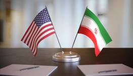 US and Iran flags (Shutterstock/vchal)