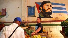 A man buys fruit at a market in Havana (Yander Zamora/EPA-EFE/Shutterstock)