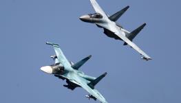 Sukhoi Su-35 multi-role fighter (top) and fighter-bomber/strike aircraft on display at the MAKS 2019 International Aviation and Space Salon, Zhukovsky, Russia, August 29, 2019 (Maxim Shipenkov/EPA-EFE/Shutterstock)