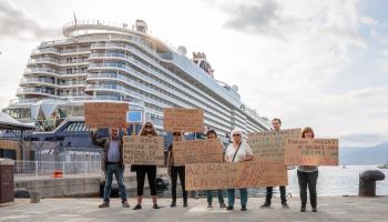 Activists protest against the arrival of two cruise ships consuming heavy fuel oil with a sulphur content 1,500 times higher than that allowed for diesel cars, legal until 2025 when the IMO's 0.5% sulphur content limit will apply to the Mediterranean, Ajaccio, Corsica, June 13 (Fanny Hamard/SIPA/Shutterstock)