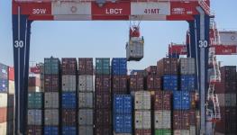 Shipping containers stacked at the Long Beach Container Terminal, California, February 9, 2023 (Ringo Chiu/SOPA Images/Shutterstock)