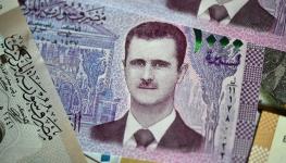 A SYP2,000 banknote, featuring President Bashar al-Assad (Shutterstock)