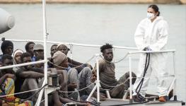 Migrants in Lampedusa, Italy (Nicola Marfisi/AGF/Shutterstock)