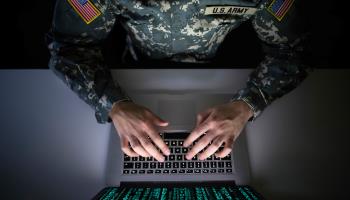 A US military officer at their computer (Shutterstock)