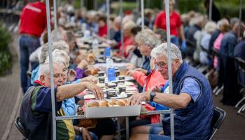 Elderly people at a group breakfast (Hollandse Hoogte/Shutterstock)