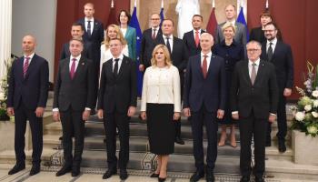 Prime Minister Evika Silina (front row, 3rd right) and her cabinet pose for a group photograph in Riga, September 15 (Xinhua/Shutterstock)