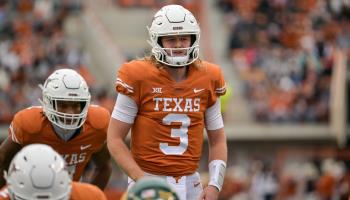 University of Texas quarterback Quinn Ewers plays in a game against Baylor University, Austin, Texas, November 25, 2022 (Patrick Green/CSM/Shutterstock)