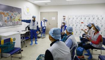 A Tokyo Electric Power Company official explains Fukushima's wastewater treatment process to foreign media (Rodrigo Reyes Marin/ZUMA Press Wire/Shutterstock)
