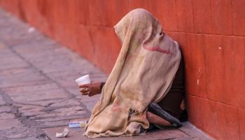 A woman begging on the streets of Mexico (Shutterstock)
