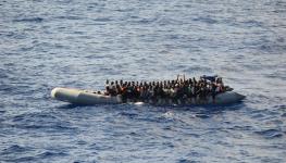 A rubber small boat with migrants in the Mediterranean Sea, 2019 (Shutterstock/AlejandroCarnicero)