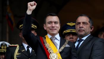 Noboa raises a fist from a balcony of the Government Palace following his inauguration, Quito, November 23, 2023 (Jose Jacome/EPA-EFE/Shutterstock)