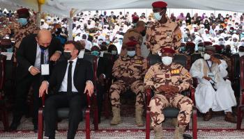 Chadian transitional President Mahamat Idriss Deby sits with French President Emmanuel Macron at the funeral of Deby's father, April 2021 (Petit Tesson Christophe/Pool/ABACA/Shutterstock)