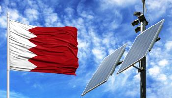 Solar panels alongside Bahraini flag (Shutterstock)
