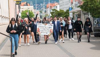 Secondary school children celebrate graduating in Nitra, Slovakia, May 19, 2023 (Antares_ NS/Shutterstock)