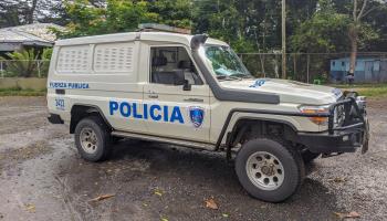 A Costa Rican police vehicle on a rural road (Shutterstock)