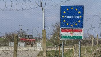 Border fence between Rastina (Serbia) and Bacsszentgyorgy (Hungary), built in 2015 against incoming refugees & migrants, Rastina, Serbia, March 19, 2016 (BalkansCat/Shutterstock)