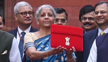 Finance Minister Nirmala Sitharaman holding a folder containing documents pertaining to the interim budget for the fiscal year beginning April 2024 (Kabir Jhangiani/NurPhoto/Shutterstock)
