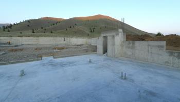 Construction site with cement foundations (Andrew H Walker/Shutterstock)