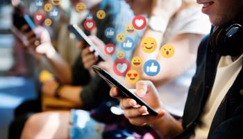 People using social media websites (Shutterstock)