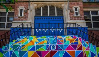 A school gymnasium in Coney Island used as temporary housing for migrants last year, New York, May 18, 2023 (Leonard Zhukovsky/Shutterstock)